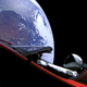 The Starman, in the driver’s seat of a Telsa Roadster, in space.